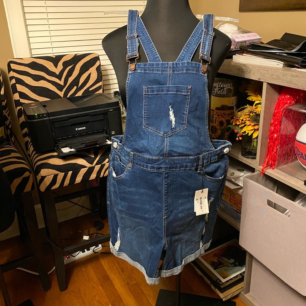 Overall shorts.
